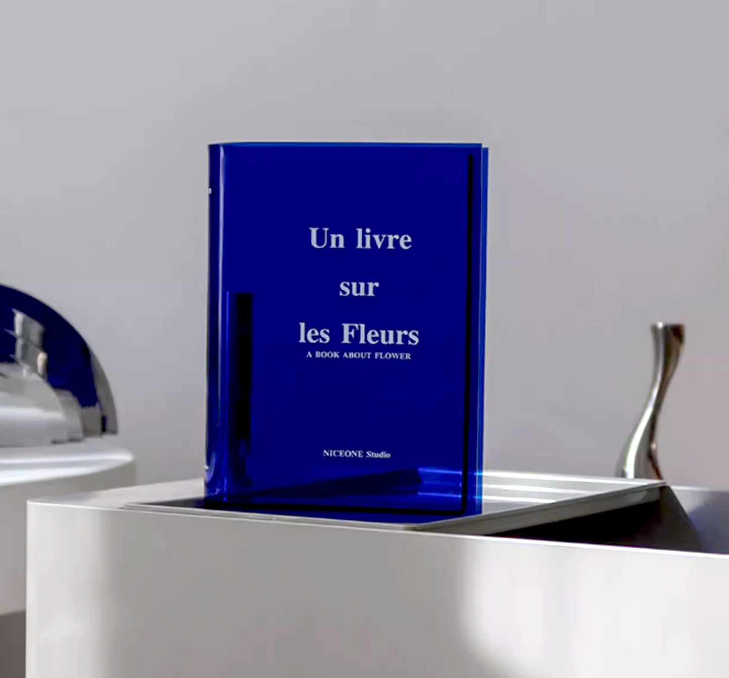 Klein blue acrylic flower vase, book shape