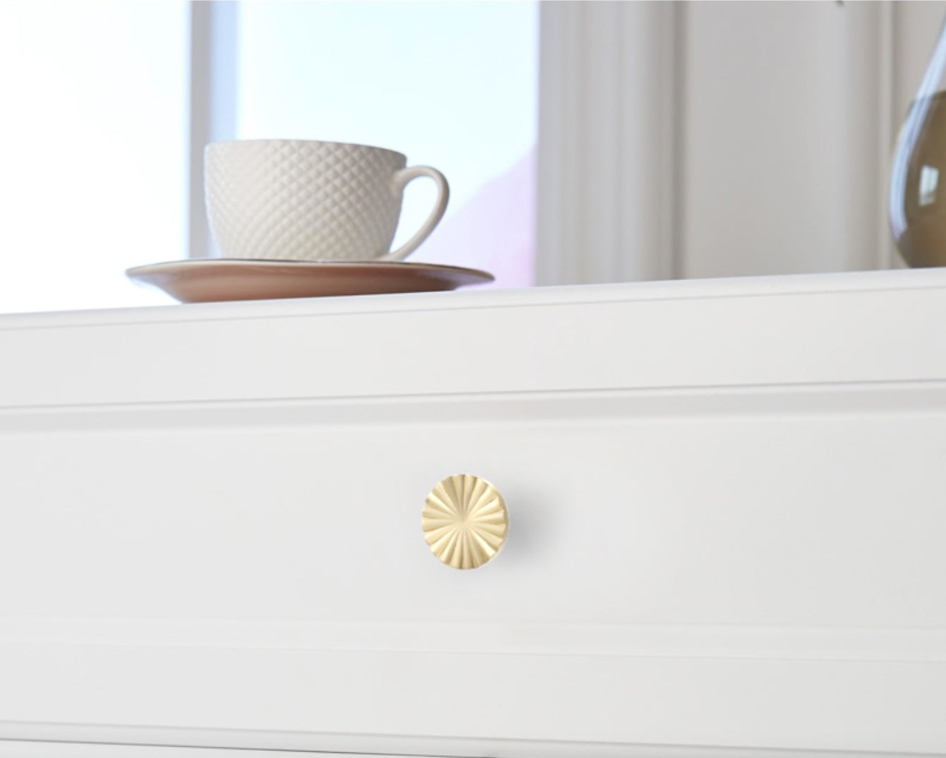 Cabinet knob, round chiselled shape, light gold colour metal, mat finish, 1 piece