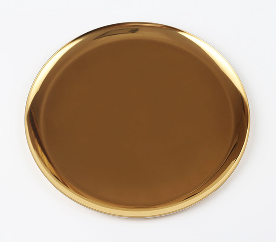 Metallic golden round tray for display and serving, gold colour with shiny finish
