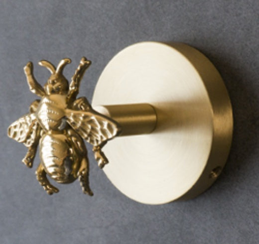 Hanger, beetle design, light gold colour metal, shiny finish